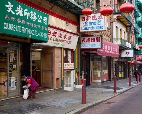 Storefronts and balconies on Waverly Place, Chinatown
